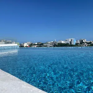 https://pavo-real-city-playa-del-carmen.quintano-roohotels.com